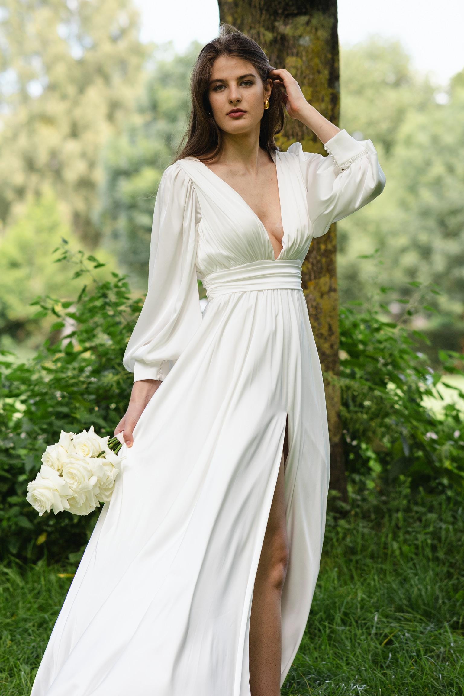 vestito sposa abito elegante con maniche a palloncino Abito da sposa in seta a trapezio: schiena scoperta, maniche a palloncino  Italia