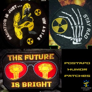 May include: Three embroidered patches with a black background and yellow, red, and white accents. The first patch features a cartoon figure in a yellow hazmat suit with the text "Radiation is just spicy air". The second patch features a skeleton hand holding a yellow radiation symbol with the text "Stay Rad". The third patch features a pair of red sunglasses with yellow mushroom clouds inside and the text "The future is bright".