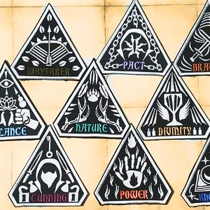 May include: Twelve black triangular patches with white designs and text. The patches feature various symbols and words, including "Rage", "Wayfarer", "Pact", "Bravery", "Balance", "Nature", "Divinity", "Devotion", "Inspiration", "Cunning", "Power", and "Knowledge".
