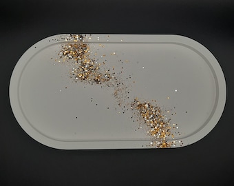 Schönes und feines ovales Tablett mit Goldglitzer verschönert