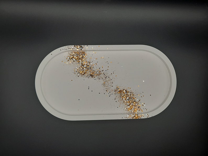 Schönes und feines ovales Tablett mit Goldglitzer verschönert Bild 2