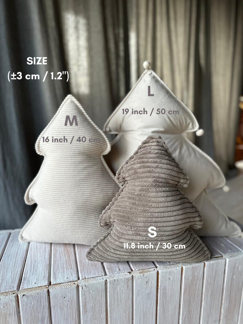 May include: Three tree-shaped decorative pillows in varying sizes. The largest is 19 inches (50 cm) tall, the medium is 16 inches (40 cm), and the smallest is 11.8 inches (30 cm). The pillows are in neutral tones of beige and brown, with corduroy and ribbed textures.