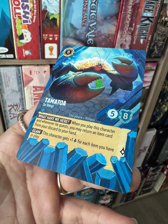 tamatoa lorcana card - The First Chapter - - So Shiny! (Super Rare) the opposing players together choose an item or location of theirs and banish it. Disney Lorcana Card Altered Art