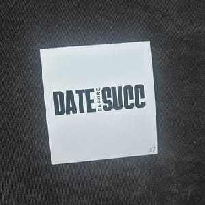 May include: White label with black text that reads "DATE BEFORE SUCC" and the number 37.