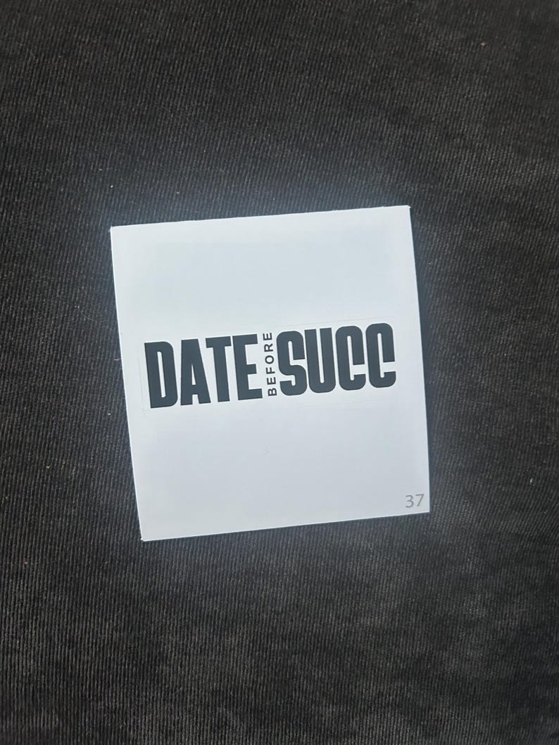May include: White label with black text that reads "DATE BEFORE SUCC" and the number 37.