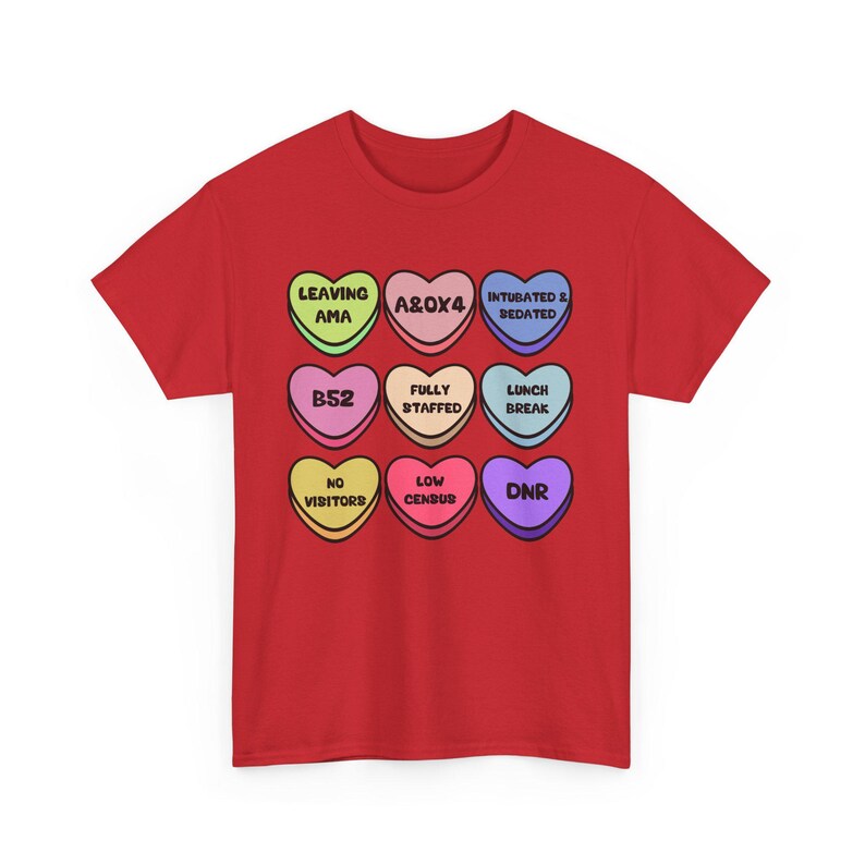 Funny nurse Valentine shirt featuring candy hearts with medical terms like “A&Ox4,” “B52,” and “Fully Staffed.” Perfect nurse humor tee for Valentine’s Day or any shift. Made on comfy Gildan 5000 unisex shirts with high-quality print. Ideal gift for nurses, techs, or healthcare workers who love a laugh. Support a fellow nurse and grab this sweet and sassy hospital-themed shirt today!