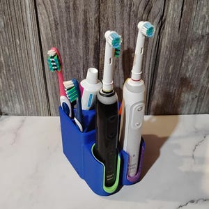Oral B Zahnbürstenhalter | Regal oder an der Wand montierbarer Zahnbürstenhalter für 2 elektrische Zahnbürsten und mehr