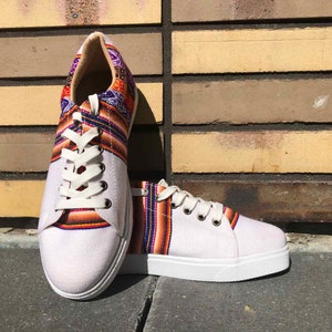 The shoes are made of soft fabric with rubber bottom. The shoes are made of woven fabrics with Inca patterns. Peruvian shoes, sneakers with Inca textile from Peru, sneakers cat, converse style, Peruvian sneakers, Inca textile, handmade ethnic shoes.