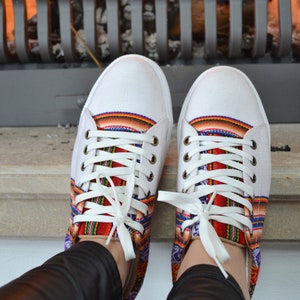 The shoes are made of soft fabric with rubber bottom. The shoes are made of woven fabrics with Inca patterns. Peruvian shoes, sneakers with Inca textile from Peru, sneakers cat, converse style, Peruvian sneakers, Inca textile, handmade ethnic shoes.