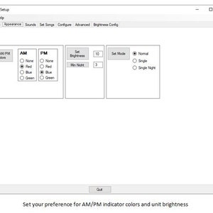 May include: A computer screen showing the "Clock Setup" interface. It features options to set AM/PM colours, brightness, and mode. The interface allows users to customise the clock's appearance, with red, blue, and green indicator options. The text "Set your preference for AM/PM indicator colours and unit brightness" is at the bottom.