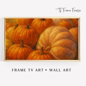 May include: A framed artwork depicting a cluster of orange pumpkins. The pumpkins have different sizes and forms, with visible stems and textured surfaces. The artwork is framed in a gold border. Text at the bottom reads "FRAME TV ART • WALL ART".