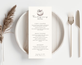 May include: A Thanksgiving menu with a hand-drawn illustration of a pumpkin. The menu lists the courses: First Course, Main Course, and Dessert. The date and location of the event are listed at the bottom.