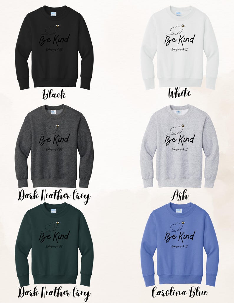 May include: Sweatshirts in black, white, dark heather grey, ash, dark heather grey, and Carolina blue. Each sweatshirt features the text "Be Kind" with a heart and bee design, and the Bible verse Ephesians 4:32.