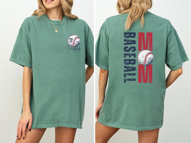 Custom baseball Mom Shirt. The baseball TShirt says baseball mom on the back in navy and red. The front is personalized with a baseball and the player name and number. Comfort colors tee, crewneck, short sleeves