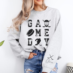 Hockey Mom Sweatshirt Hockey Game Day Sweatshirt Hockey Grandma Sweatshirt Personalized Hockey Sweatshirt Name on Sleeve Custom Hockey Gifts