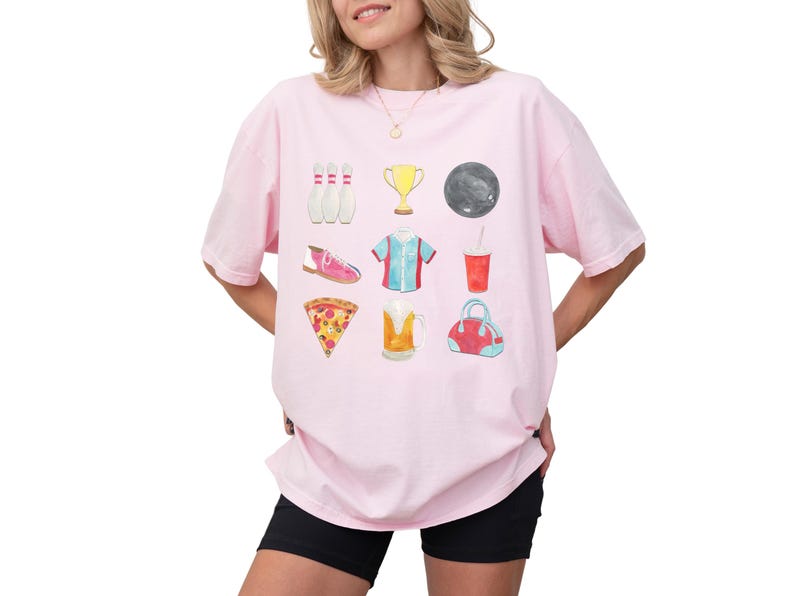Retro bowling shirt for women. The tshirt has watercolor graphics and features bowling pins, trophy, bowling ball, shoes, shirt, soda, pizza, beer and a bowling bag. Short sleeves, crewneck, comfort colors, ivory