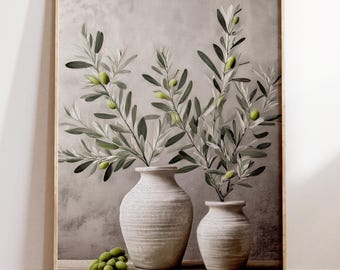 May include: A framed print featuring two white ceramic vases holding olive branches with green olives. A small pile of olives rests on a wooden surface in front of the vases. The background is a textured, neutral gray.