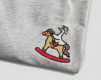 Embroidered Silly Goose T-Shirt: Cowgirl Rocking Horse Design