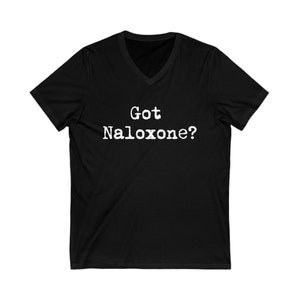 May include: Black v-neck t-shirt with the text "Got Naloxone?" printed in white.
