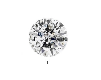 May include: A close-up of a round, clear diamond with inclusions. The diamond is graded as "I" for clarity.