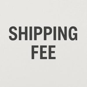 May include: Text on a light beige background reads "SHIPPING FEE" in a bold, dark gray font. The text is centered and takes up most of the image space, with a simple, clean design.