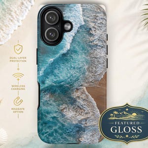 May include: A phone case featuring an aerial view of turquoise ocean waves crashing onto a sandy beach. The case has a black camera housing and includes icons for dual layer protection, wireless charging, and a MagSafe option label.