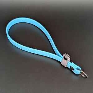 light blue and gray biothane adjustable wrist strap for e-collar remote transmitter for dog training