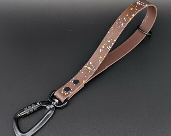 Brown Biothane Traffic Handle with White and Gold Splatter Paint, O Ring, and Carabiner Clip
