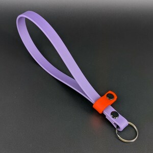dark purple and orange biothane adjustable wrist strap for e-collar remote transmitter for dog training