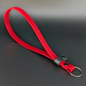 red and black biothane adjustable wrist strap for e-collar remote transmitter for dog training