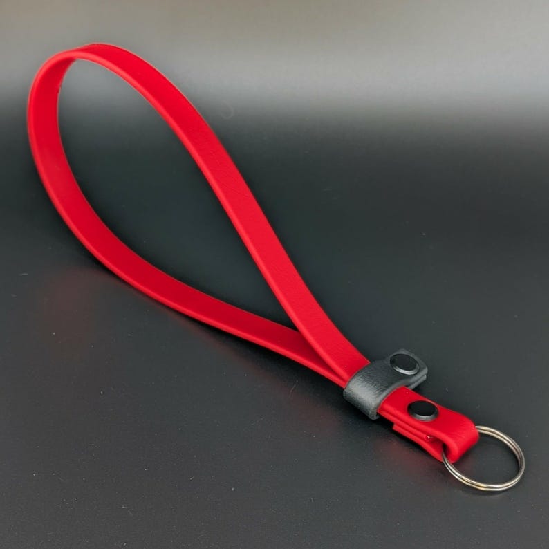 red and black biothane adjustable wrist strap for e-collar remote transmitter for dog training