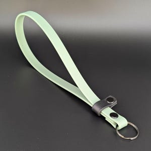 sage green and black biothane adjustable wrist strap for e-collar remote transmitter for dog training