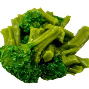 May include: A close-up of a bunch of fresh green broccoli florets.