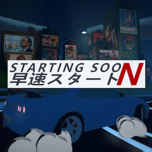 May include: A blue car with a red and white "STARTING SOON" sign in Japanese and English. The car is driving down a street with neon lights and billboards in the background.