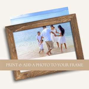 May include: A family of five is standing in the shallow water of a beach. The adults are wearing white shirts and shorts, while the children are wearing blue shirts and shorts. The family is smiling and holding hands.