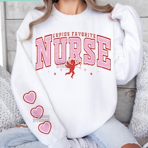 Cupido's Favorite Nurse Svg Png, Valentine Nurse Svg Png, Dia dos Namorados Svg Png, Enfermeira Svg Png, Camisa de enfermeira, Moletom de enfermeira, Arquivo digital