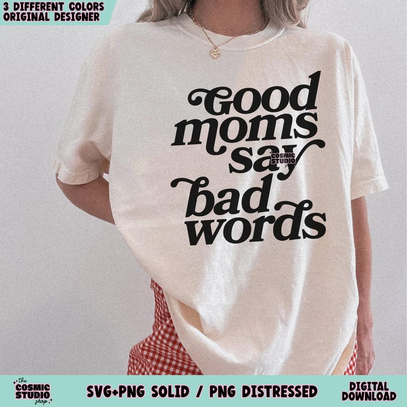 May include: Cream-colored t-shirt with the phrase "Good moms say bad words" in black script. The shirt also features the text "COSMIC STUDIO" and the words "SVG+PNG SOLID / PNG DISTRESSED" and "DIGITAL DOWNLOAD".
