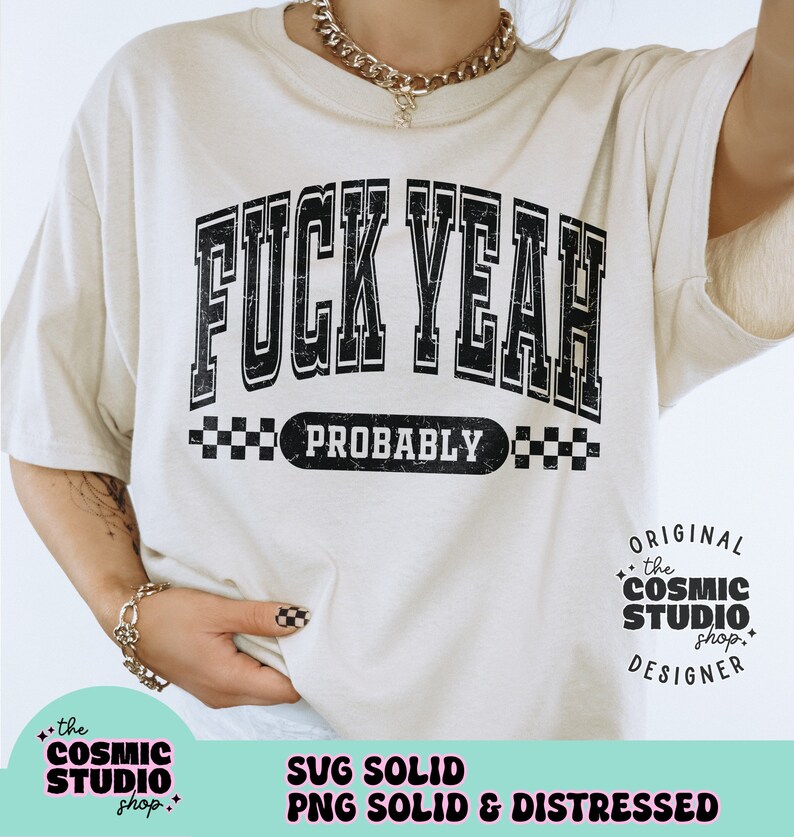 May include: A white t-shirt featuring a black graphic that reads "FUCK YEAH" in a vintage style font with a checkered pattern and the word "PROBABLY" underneath. The graphic has a distressed, vintage look. This t-shirt is a popular choice for casual wear.