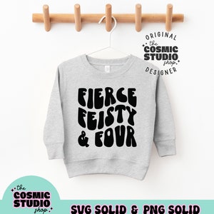 May include: A light gray sweatshirt with the words "FIERCE FEISTY & FOUR" in large, black, bubble letters. The sweatshirt is hanging on a white hanger against a white background. The text "the COSMIC STUDIO shop" is also visible.
