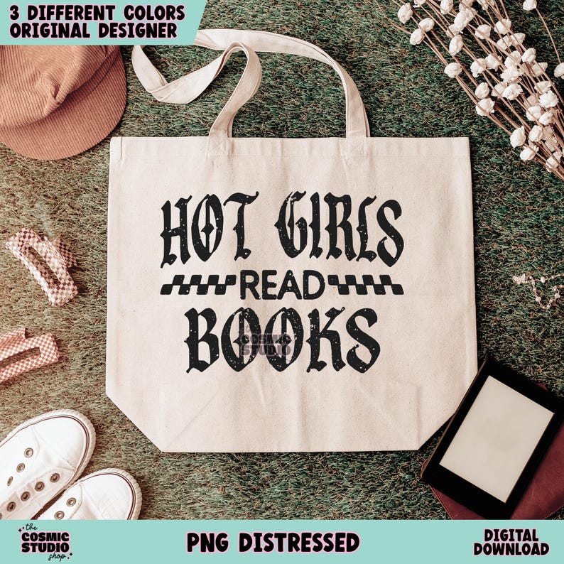 May include: A white tote bag with black text that reads "HOT GIRLS READ BOOKS" in a distressed font. The text is in a gothic style font.