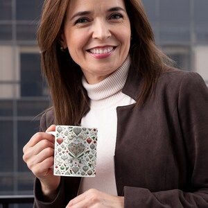 A woman outdoors, smiling broadly with the Pet Lover mug in hand, reflecting a moment of joy with her favorite animal companions in mind.
