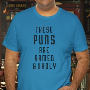 Father&#39;s Day Gift T-shirt, Gift for him,  Premium Graphic Tee, Puns, Dad Jokes &quot;These Puns Are Armed & Dadly&quot;