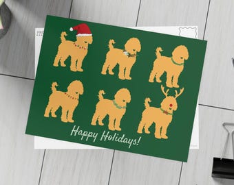 May include: A rectangular greeting card with a dark green background featuring six golden-colored doodle dogs. The dogs wear festive accessories like a Santa hat, wreaths, and reindeer antlers. The text Happy Holidays is printed in white script.