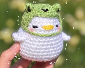 Peluche canard et bonnet grenouille