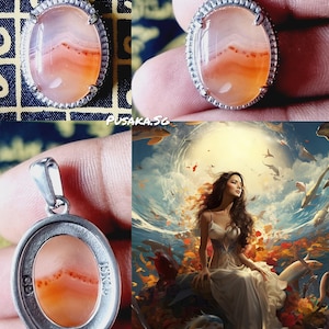 May include: A silver pendant with a light orange agate stone. The stone has a layered pattern with red and white accents. The pendant is oval shaped and has a silver bail.