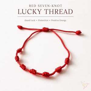 May include: A red seven-knot lucky thread bracelet featuring seven distinct knots tied along a thin cord. The text above reads RED SEVEN-KNOT LUCKY THREAD, followed by Good Luck • Protection • Positive Energy. The cord has adjustable ends.