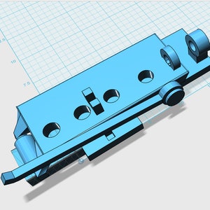 May include: A light blue plastic part with several holes and a lever. The part is designed for a guitar.