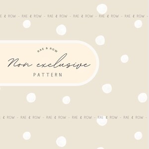 May include: A beige background with scattered white polka dots. The text "RAE & ROW" is repeated across the top and bottom. A cream-colored banner in the center reads "Non exclusive PATTERN".