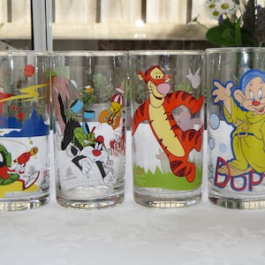 Set of 4,Collectable 1990's & early 2000's IXL Glasses Featuring Various Cartoon Characters | Tigger, Marvin the Martian, Dopey, Tweety Bird