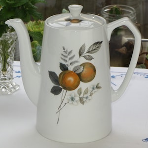 Mid Century Alfred Meakin Glo-White Ironstone Teapot with Citrus Fruit Design, initialled &#39;M&#39; and &#39;30&#39; imprint on the base.